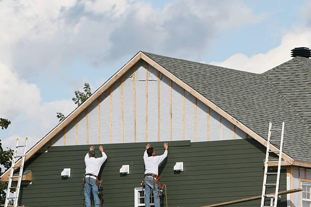 Professional Storm Damage Siding Repair technician working in Braddock Heights, MD